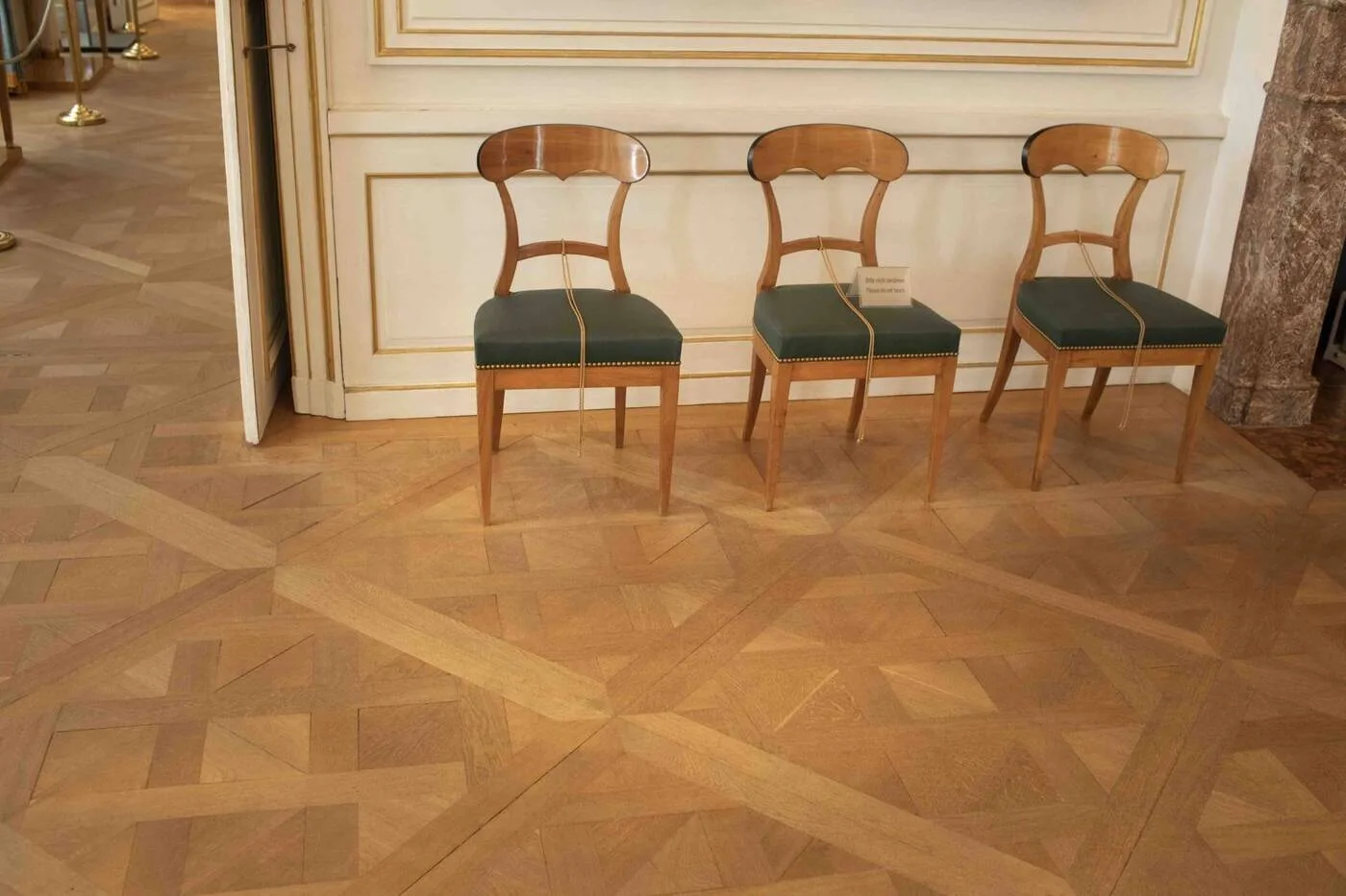 Parqué de roble de Schloss Nymphenburg con paneles tipo Versailles